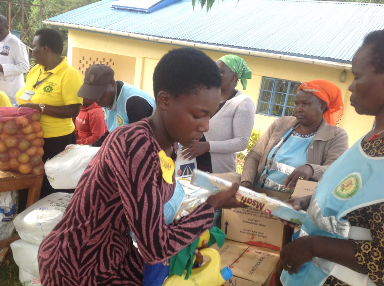 Community members and HFAW staff working together